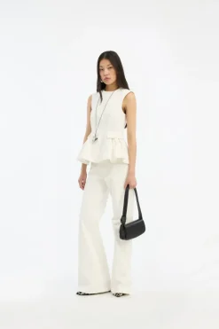 Tops-ROTATE Birger Christensen Peplum Denim Top White Denim Raw White Denim color