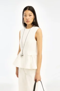 Tops-ROTATE Birger Christensen Peplum Denim Top White Denim Raw White Denim color